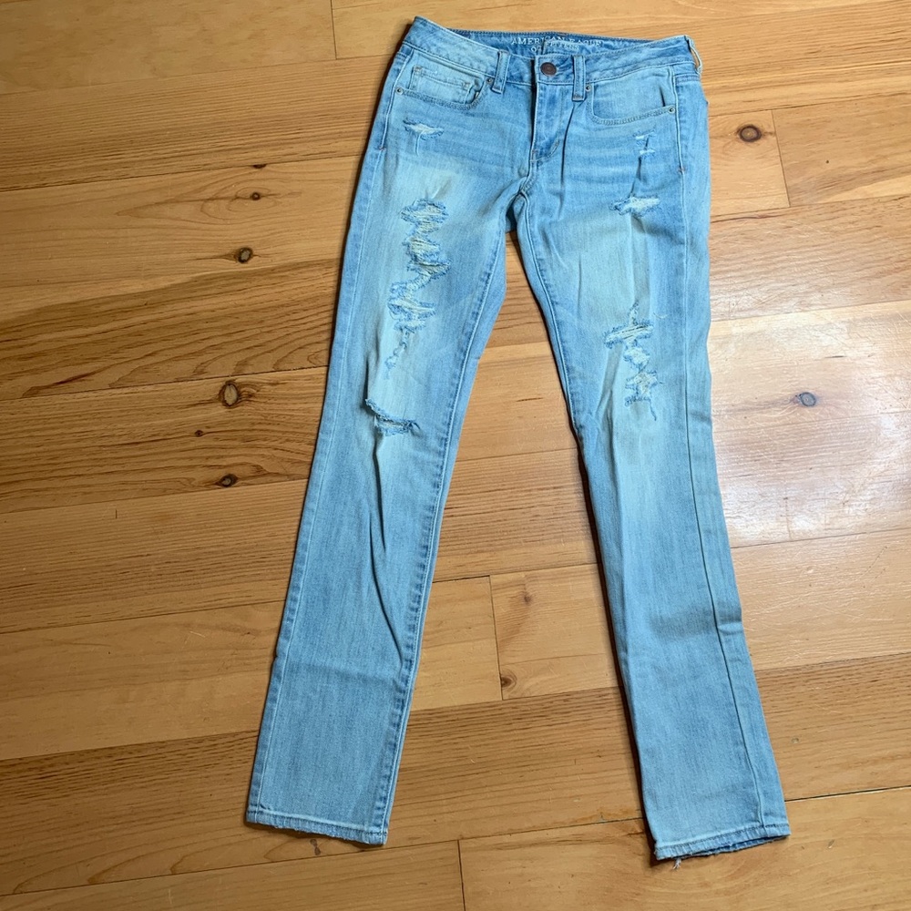 American Eagle distressed light wash skinny jeans